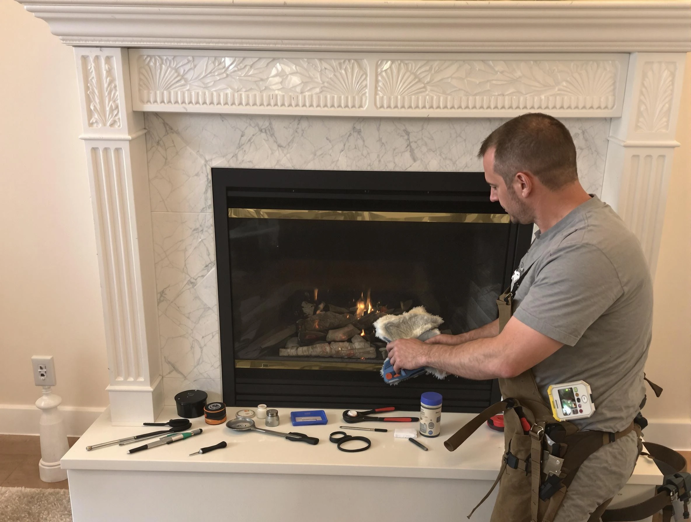 Walpole Chimney Sweep performing fireplace maintenance in Walpole, MA